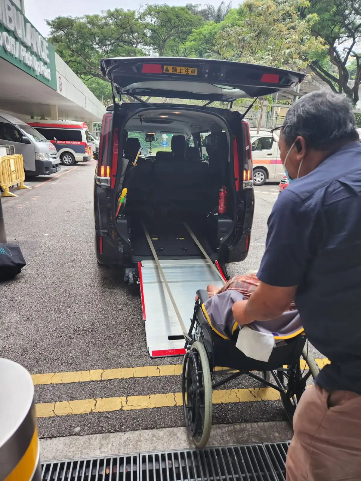 singapore wheelchair transport welcab boarding wheelchair user